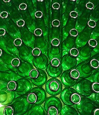 Pile of Empty Green Bottle of Beer at Goanna Brewing
